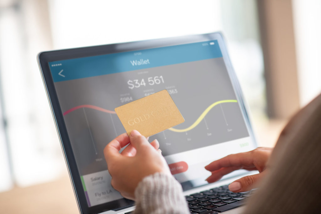 Close Up Of Woman Checking Balance Of Bank Account Online Quero Montar Uma Empresa - Contabilidade Especializada em E-commerce